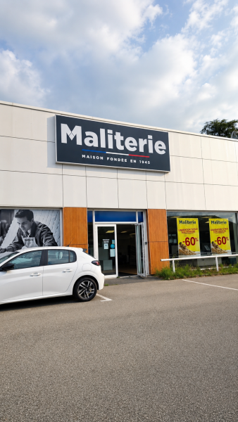 Caisson lumineux à toile tendue pour le magasin Maliterie